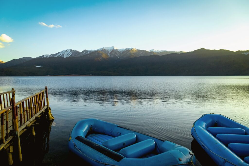 a couple of boats that are sitting in the water