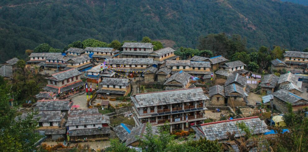 a village in the middle of a mountain range