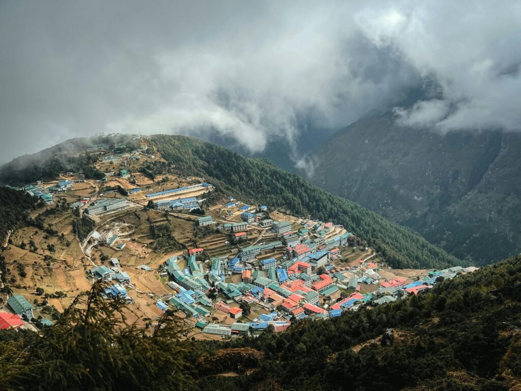A stunning aerial view of Namche Bazaar nestled in the Himalayan mountains of Nepal.