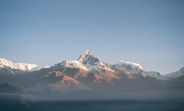 a view of a mountain range from a distance