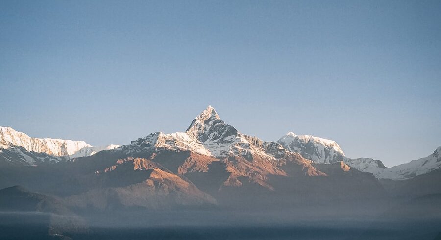 a view of a mountain range from a distance