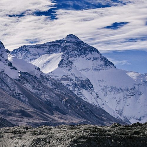 snow covered mountains under blue sky during daytime